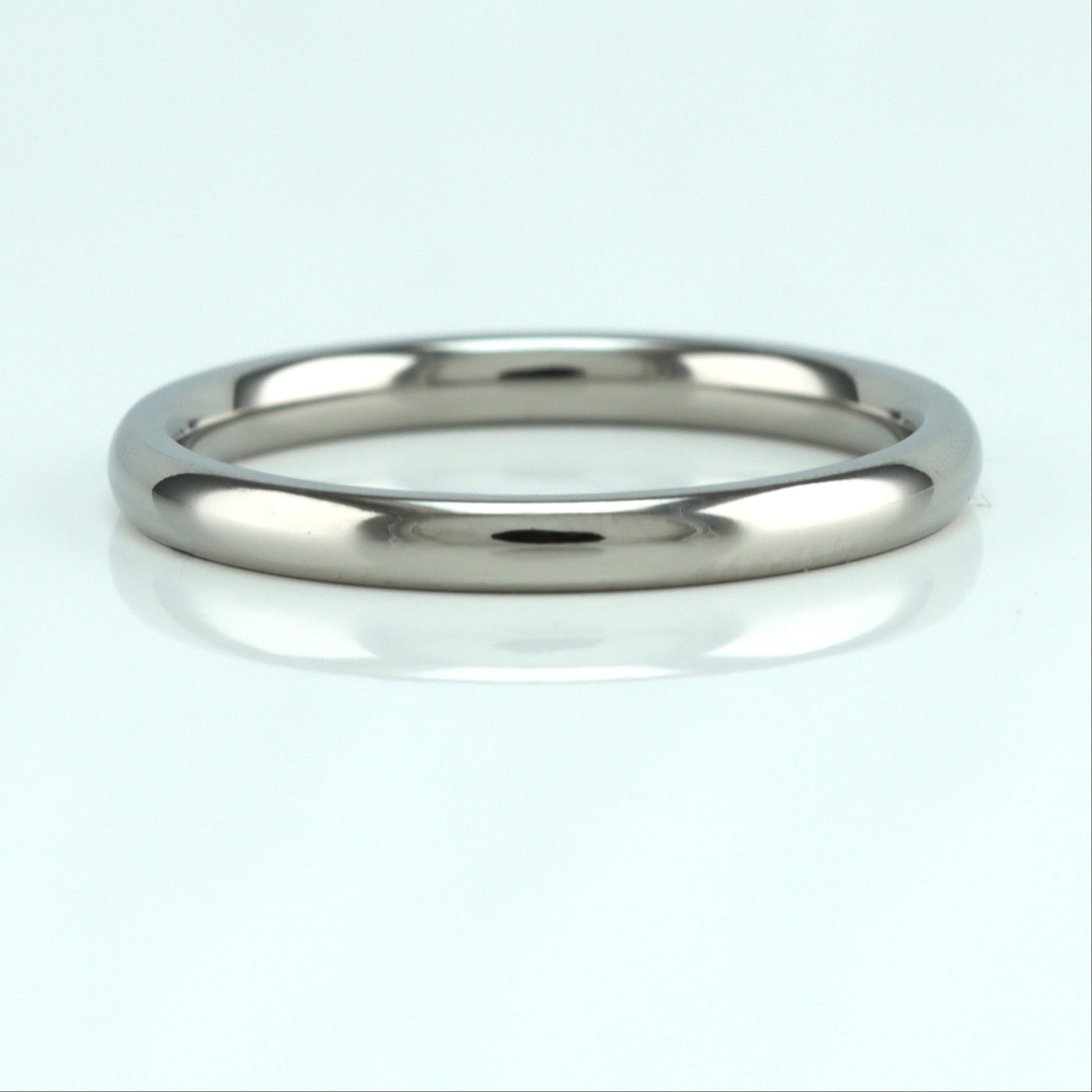 2mm titanium wedding ring for woman in a classic court shape. best titanium wedding band for woman