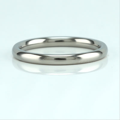 2mm titanium wedding ring for woman in a classic court shape. best titanium wedding band for woman