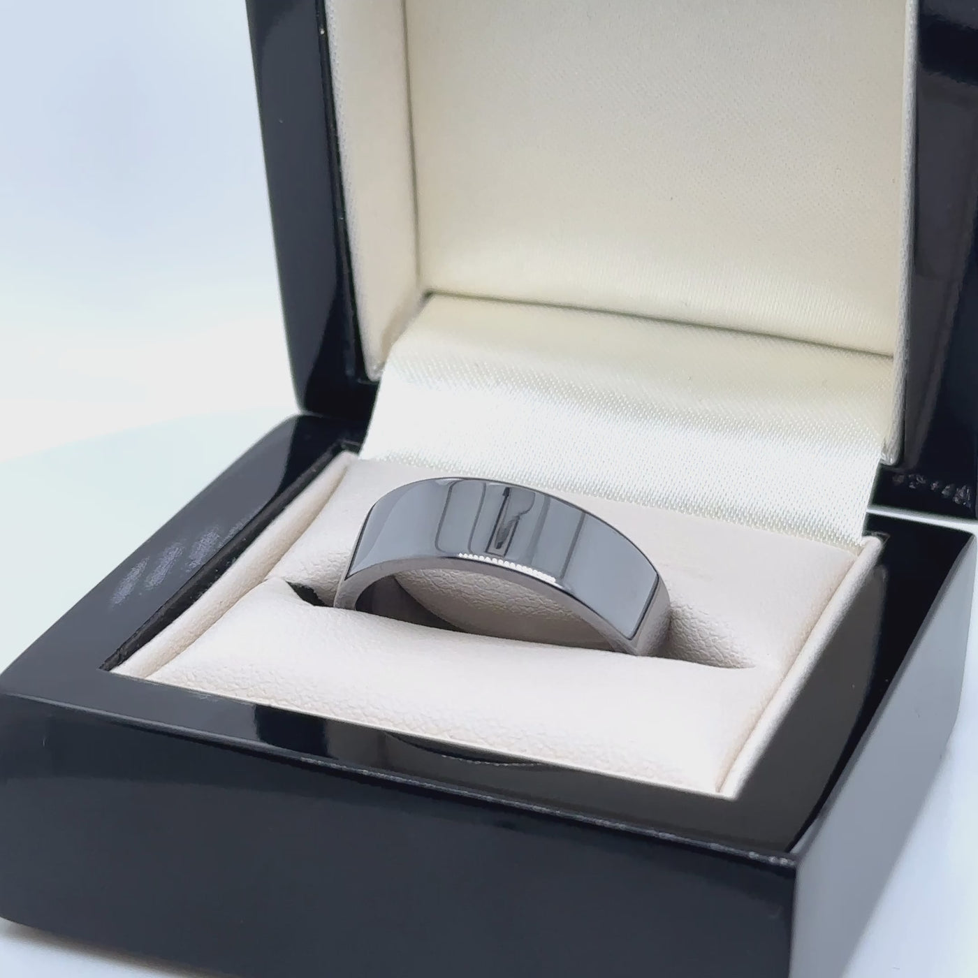 Modern polished tantalum wedding ring for men and women with a sleek flat court shape – durable, stylish, and hypoallergenic